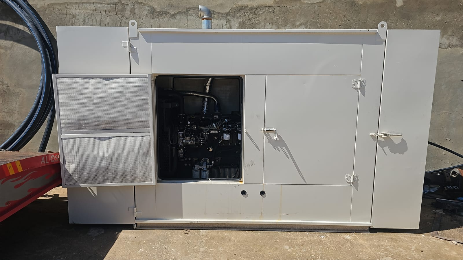 Generator enclosure with service door open