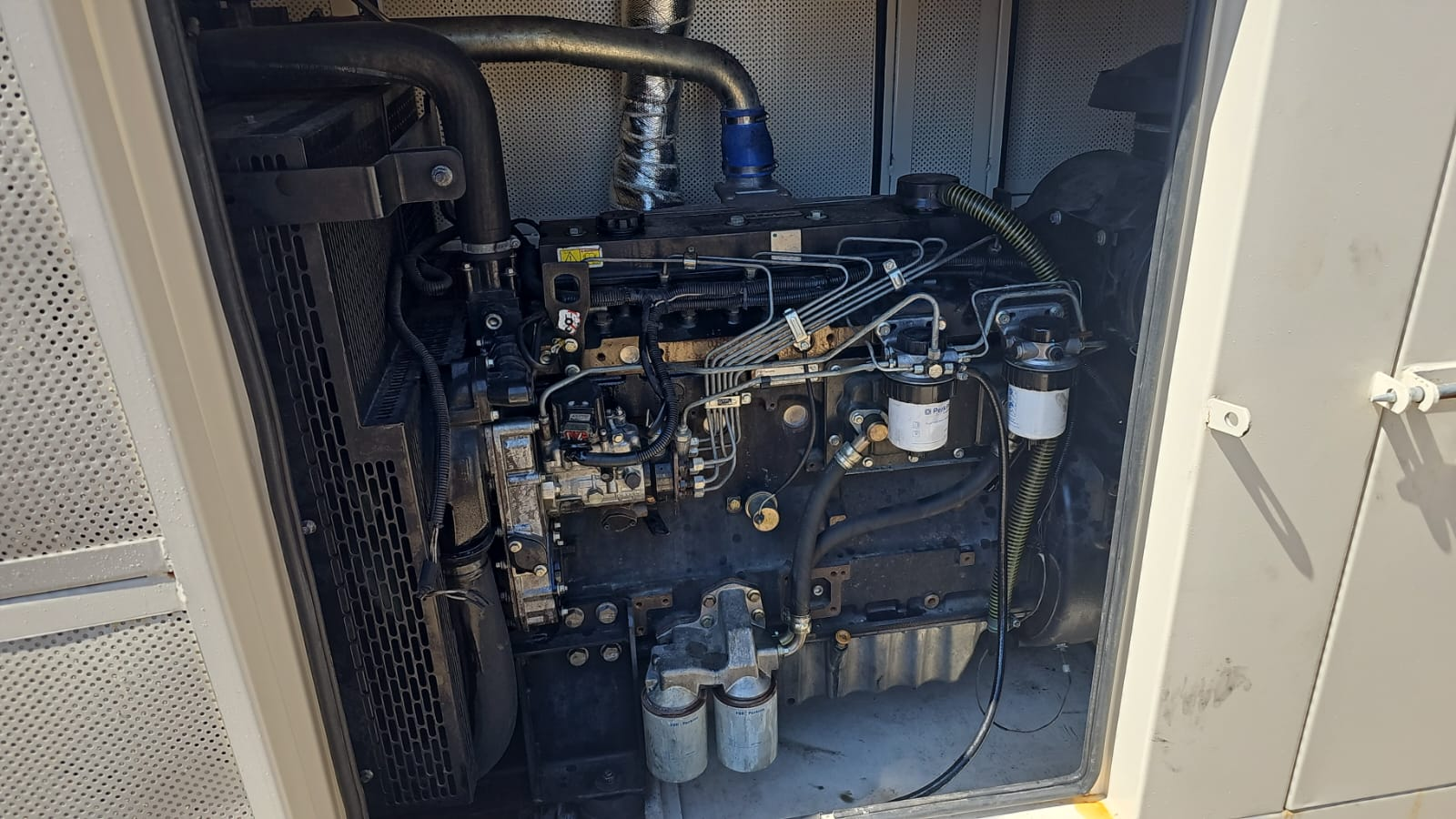 Close up of generator engine inside enclosure